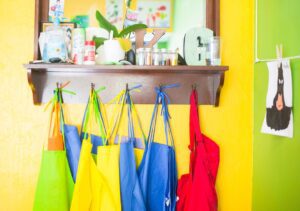 Photo 1 Childs drawing 2 Parent and child 3 School supplies 4 Playground 5 Family meal